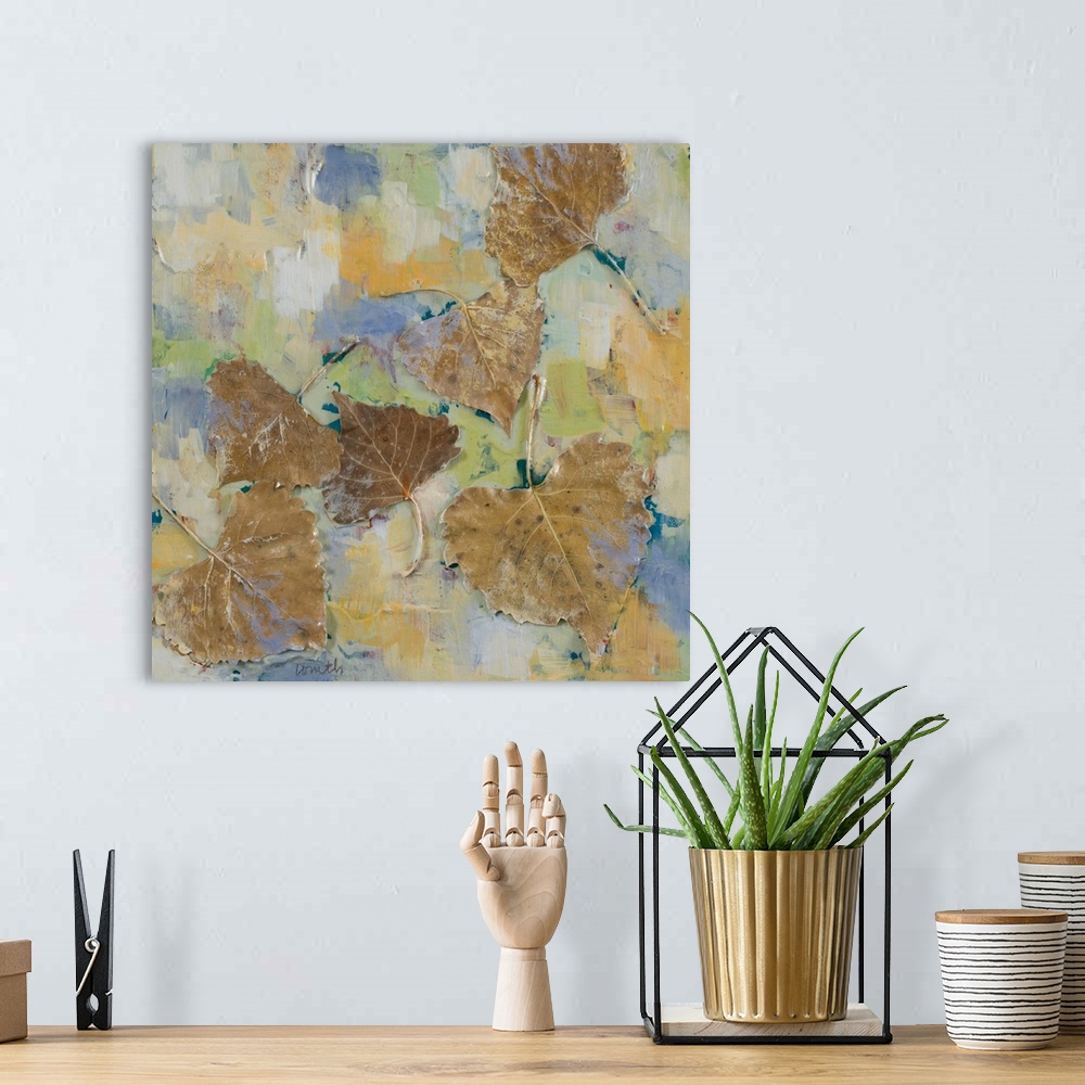 A bohemian room featuring Contemporary painting with several brown leaves surrounded by abstract color.