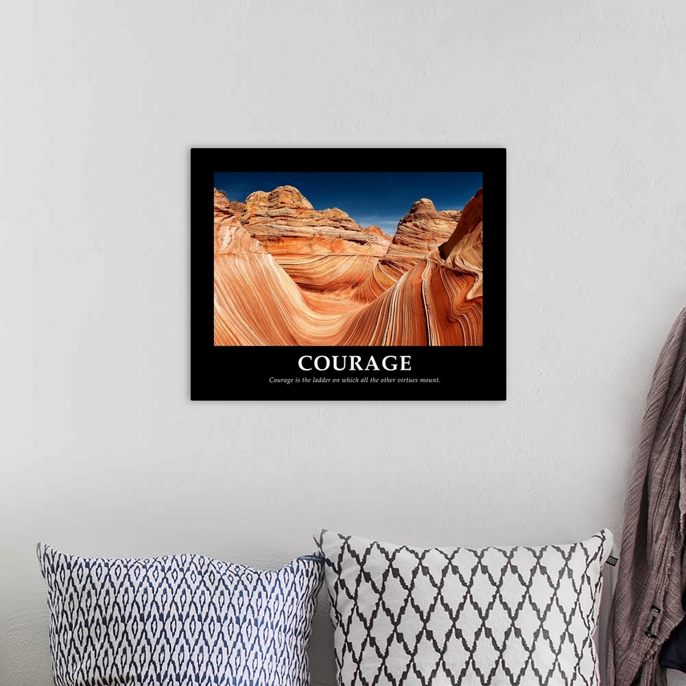 A bohemian room featuring Motivational poster inspiring courage with an image of Coyote Buttes in the Vermilion Cliffs.