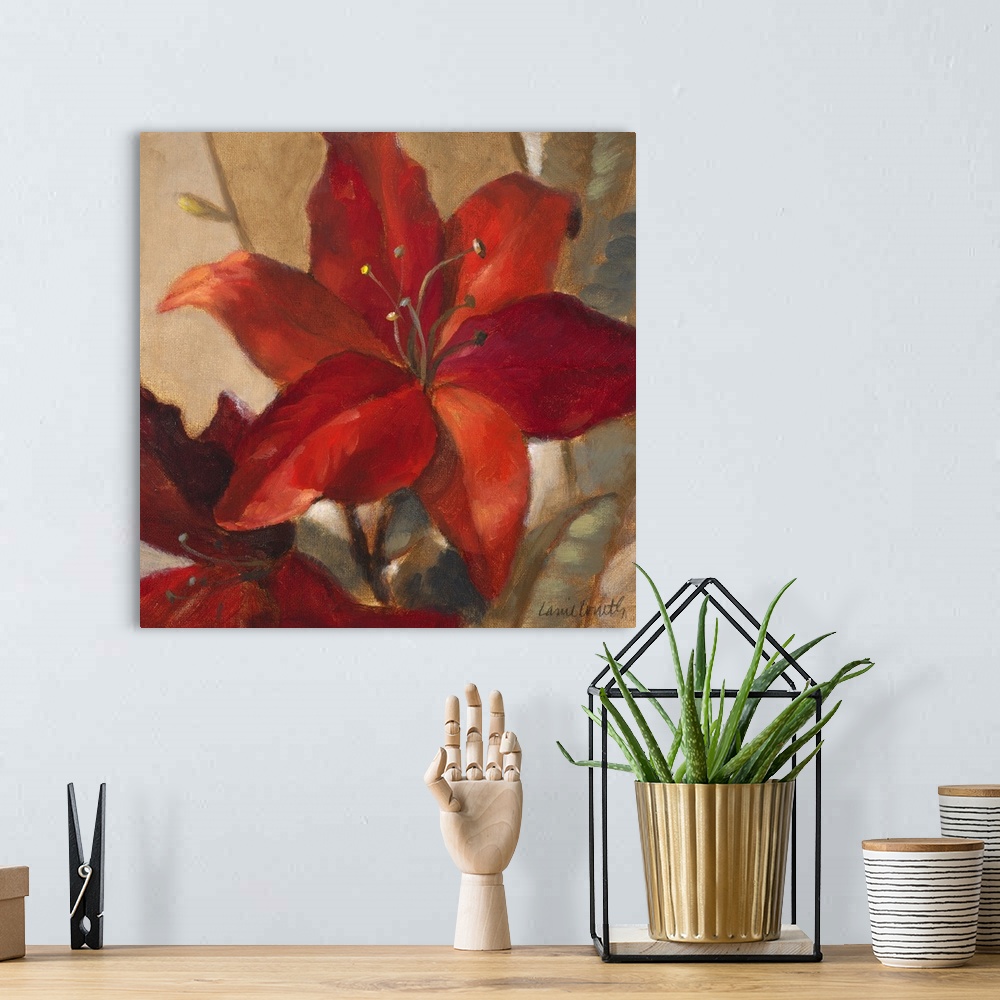 A bohemian room featuring Giant square floral painting of two deep red lilies on a background of golden earth tones.