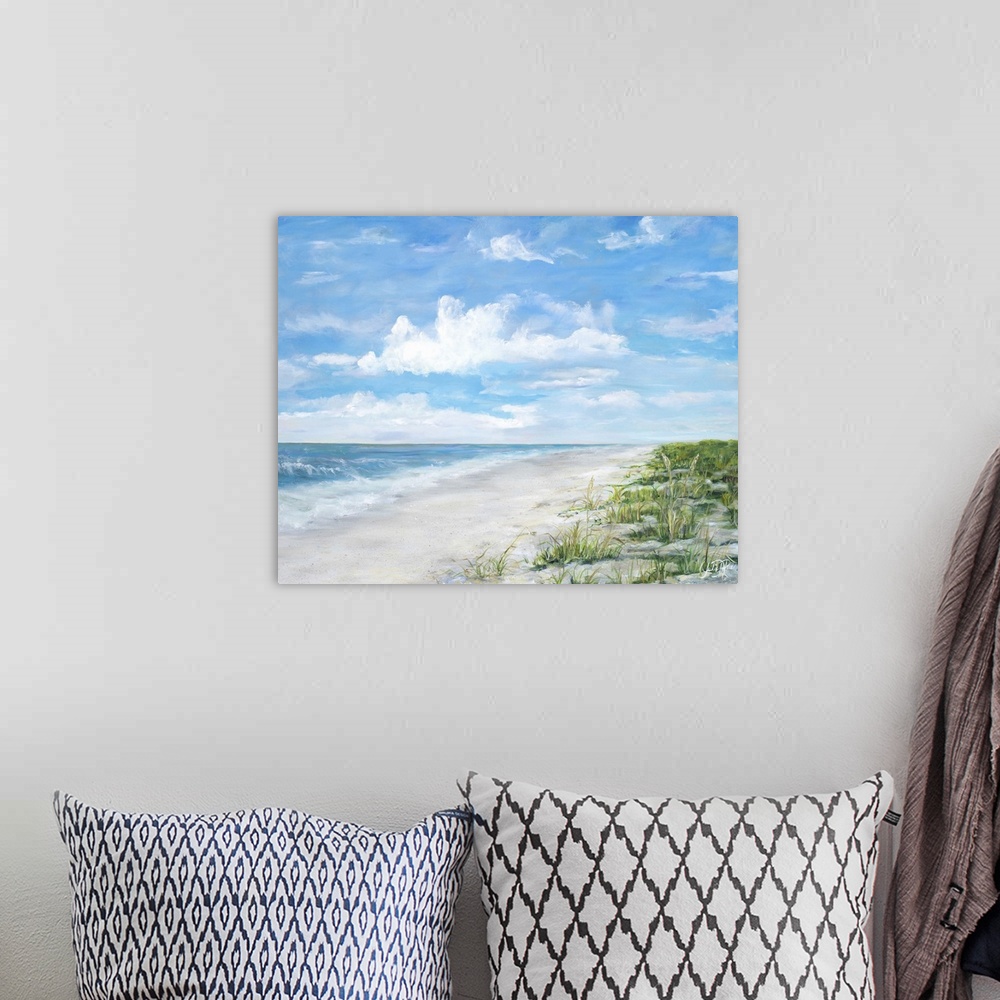 A bohemian room featuring Contemporary painting of a sandy beach with ocean waves crashing on shore.