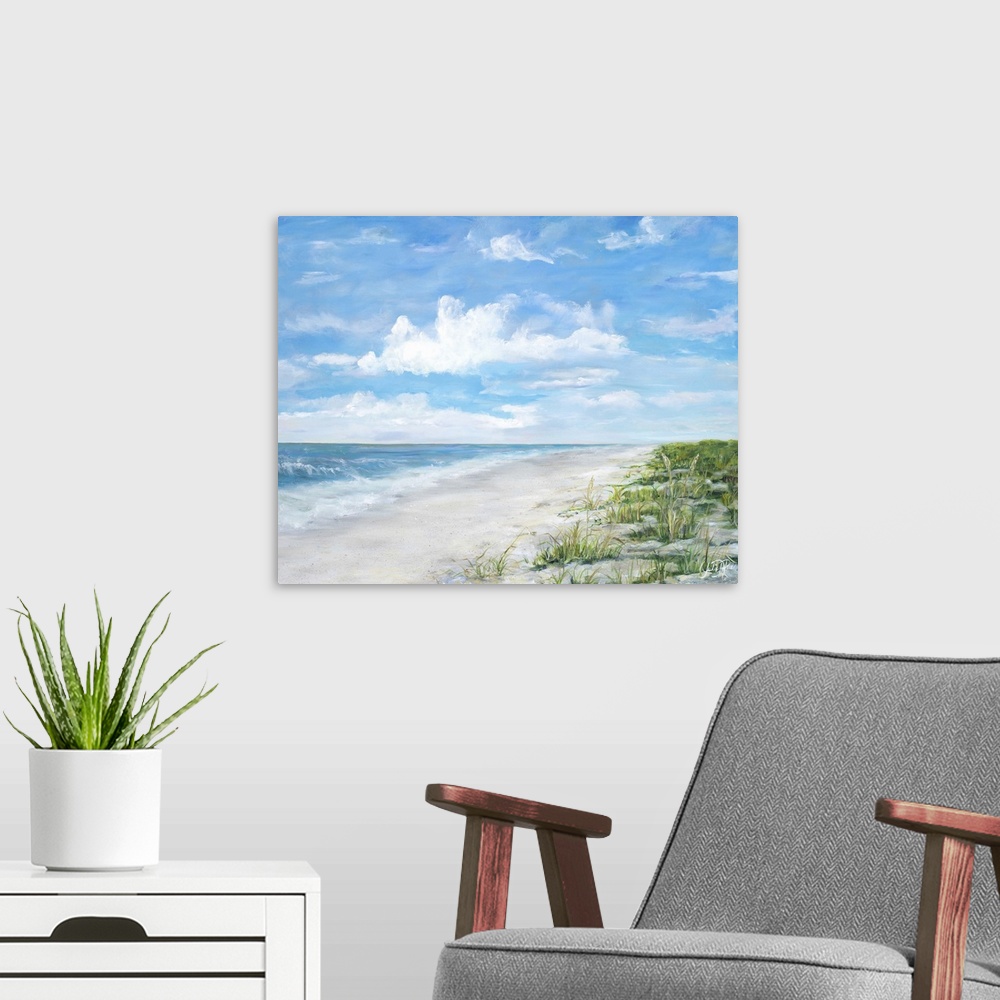 A modern room featuring Contemporary painting of a sandy beach with ocean waves crashing on shore.