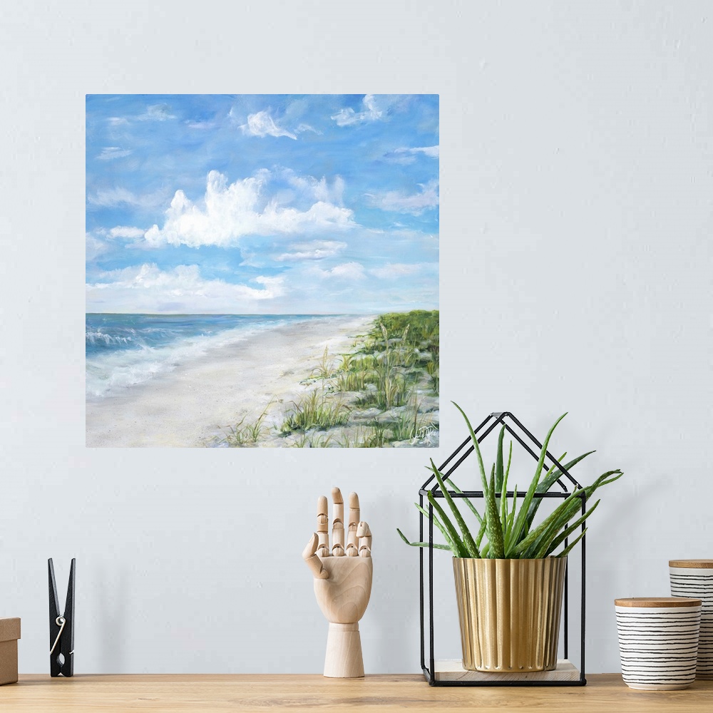 A bohemian room featuring Contemporary square painting of a sandy beach with waves crashing onto the shore.