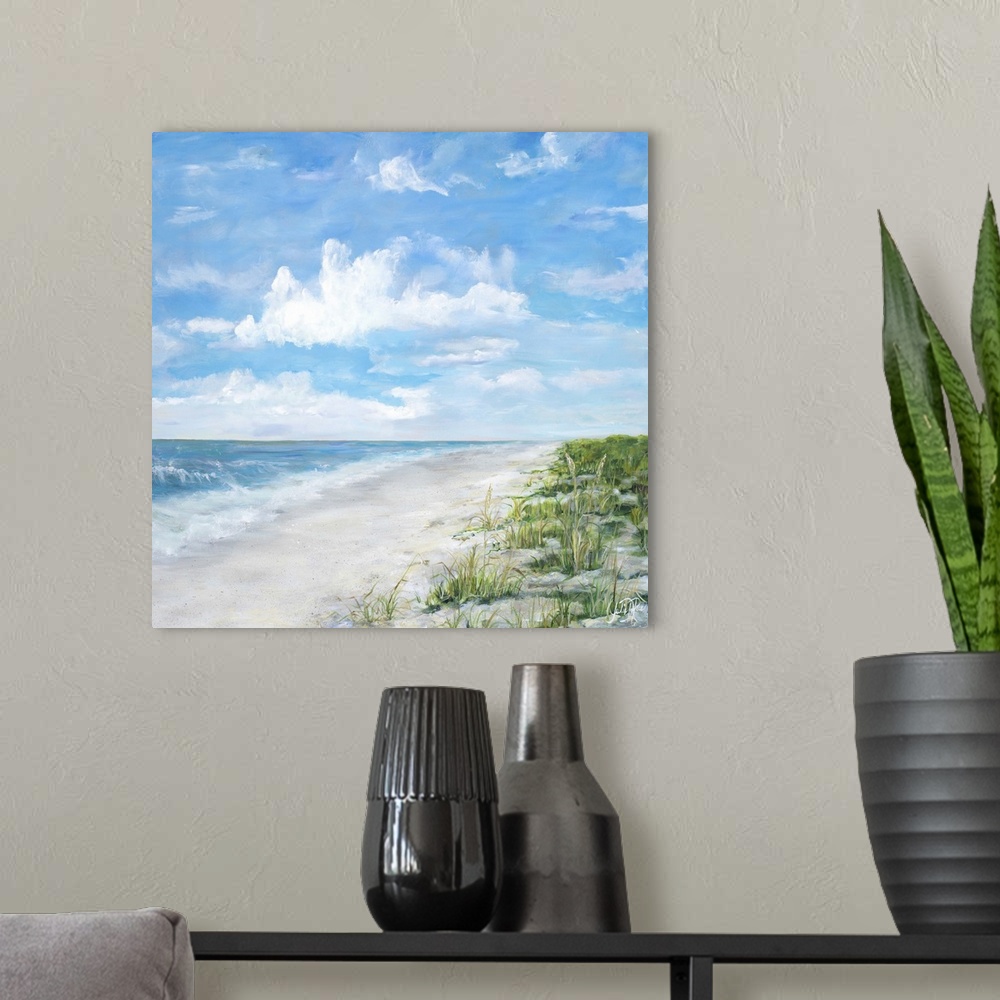 A modern room featuring Contemporary square painting of a sandy beach with waves crashing onto the shore.