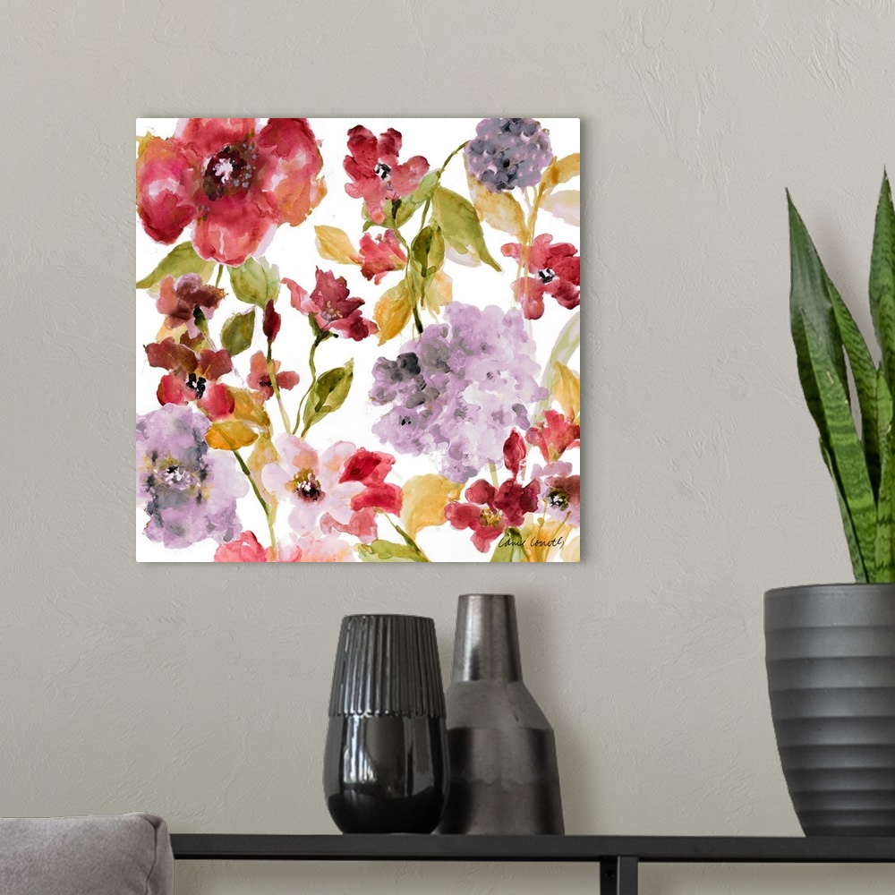 A modern room featuring A floral watercolor painting with both dark and light hues.