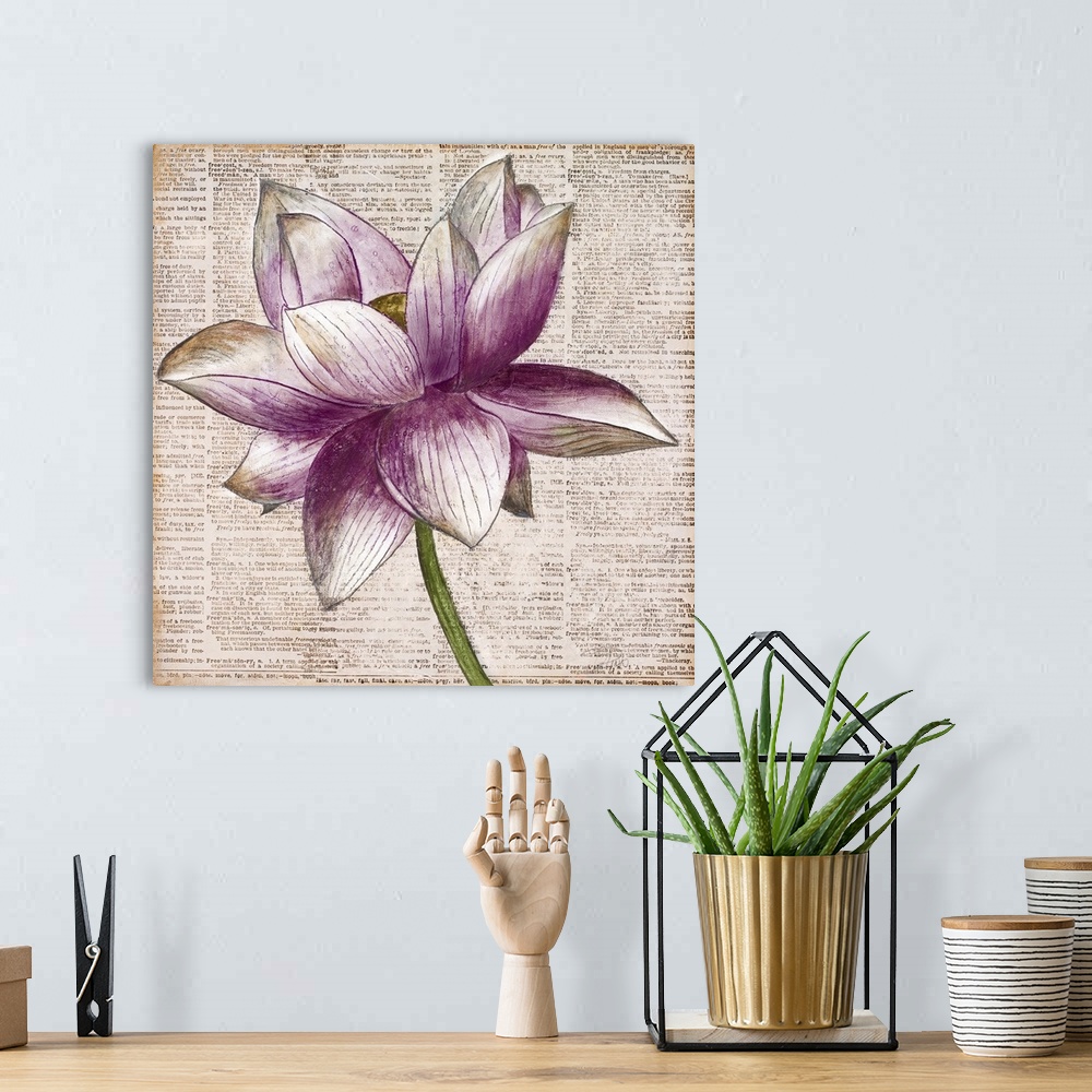 A bohemian room featuring Square artwork of a white and purple lotus flower floating over bible text.