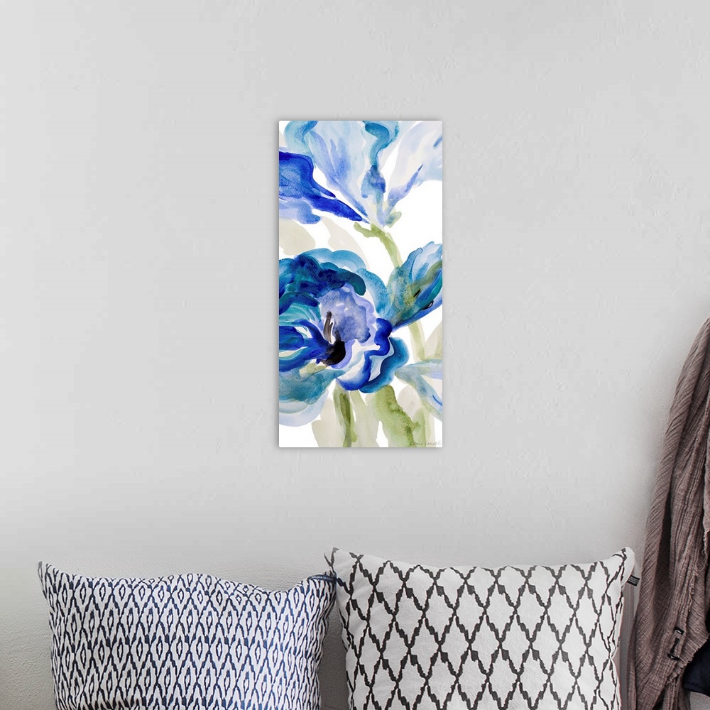A bohemian room featuring Watercolor painting of vibrant blue flowers against a white background.