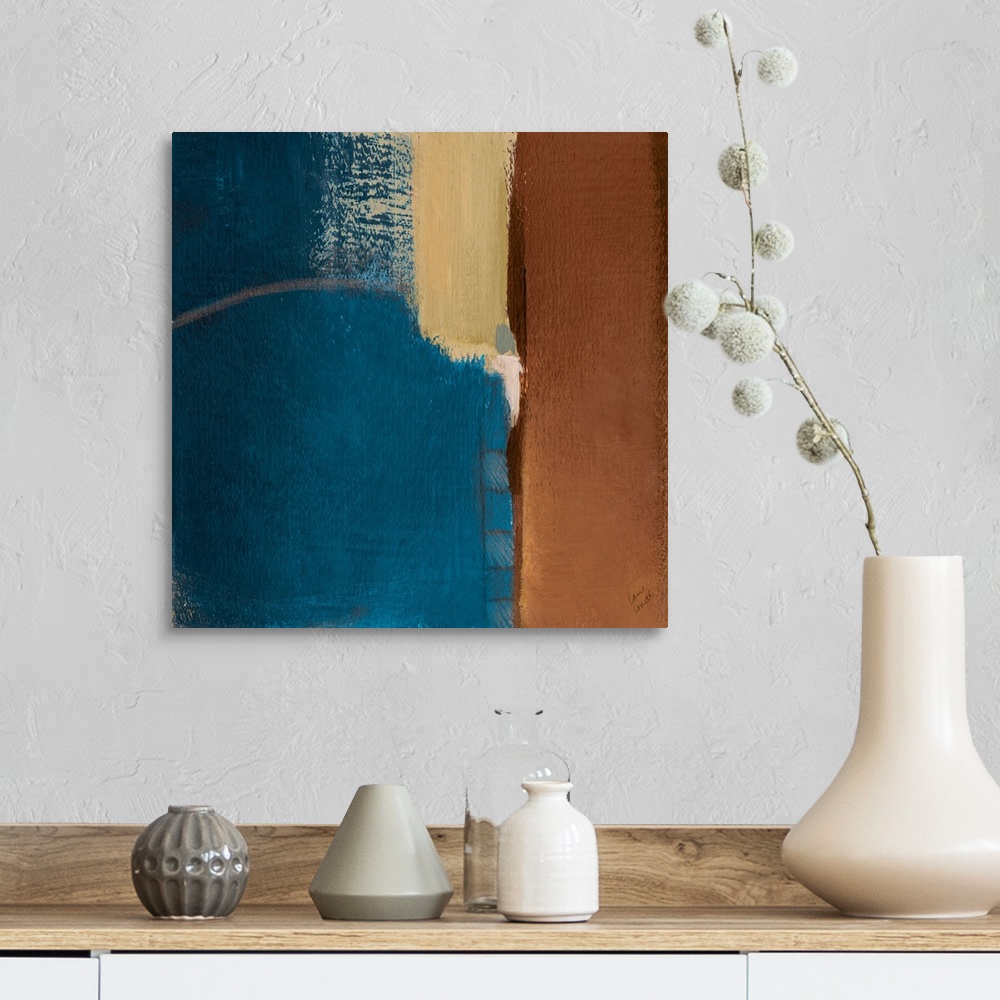 A farmhouse room featuring Abstract artwork in blue and brown.