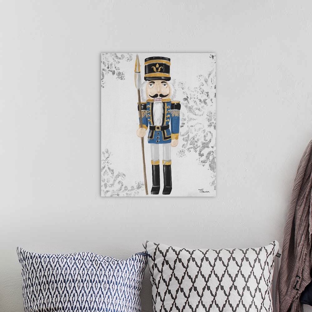 A bohemian room featuring Contemporary painting of a nutcracker in blue, black, and gold with a textured neutral colored ba...
