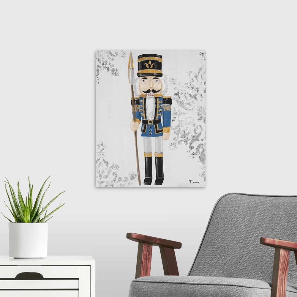 A modern room featuring Contemporary painting of a nutcracker in blue, black, and gold with a textured neutral colored ba...