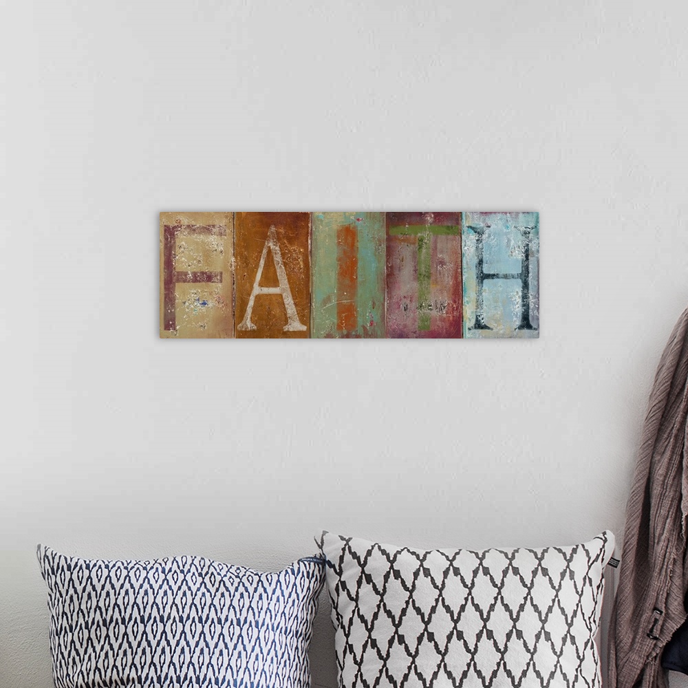 A bohemian room featuring Long painting on canvas of the letters of the word "faith" on each block of color.