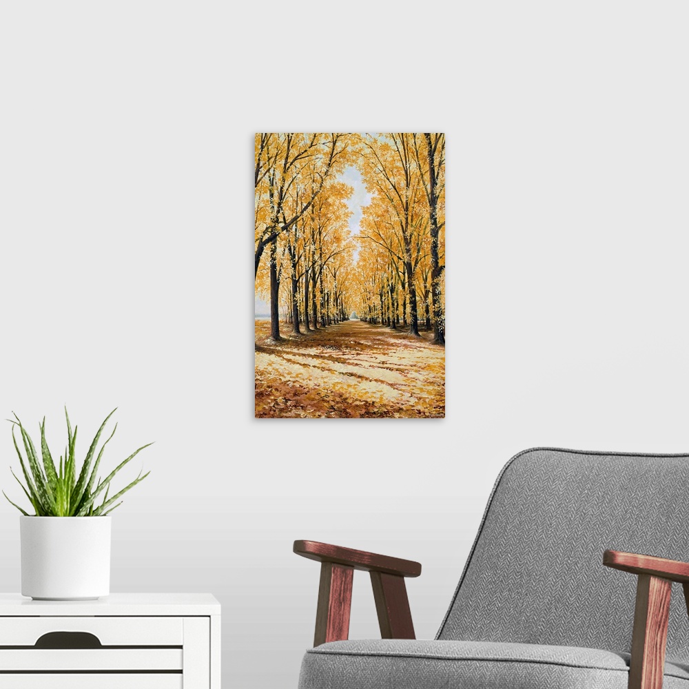 A modern room featuring Large print of a path lined with brightly colored fall trees.