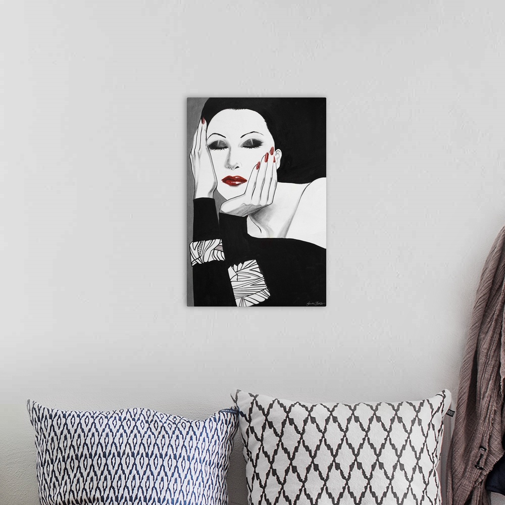 A bohemian room featuring Fashion artwork of a woman wearing black and holding her face.
