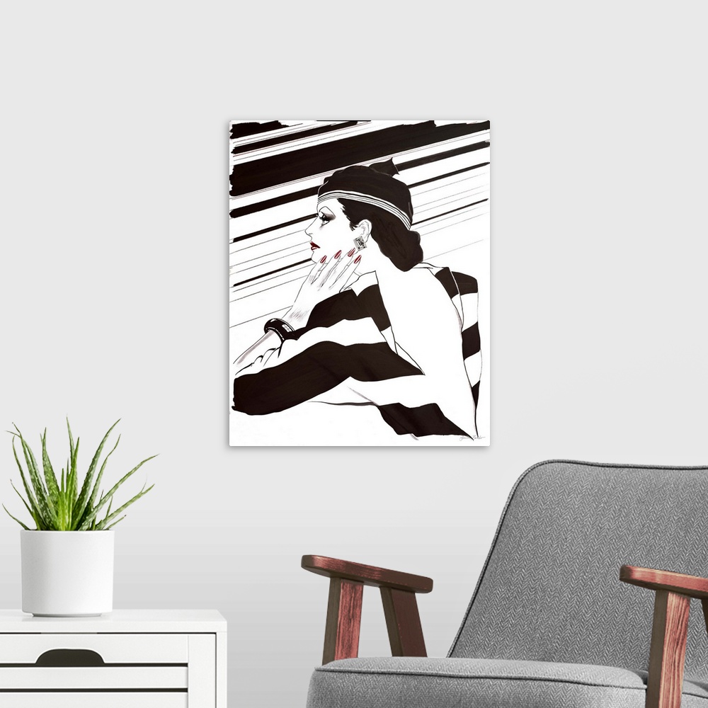 A modern room featuring Fashion artwork of a woman wearing black and stripes with an open back.