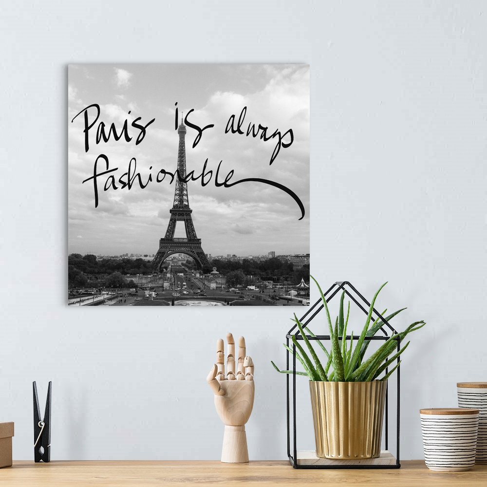 A bohemian room featuring Black and white photograph of the Eiffel Tower with "Paris is always fashionable" hand-written ov...