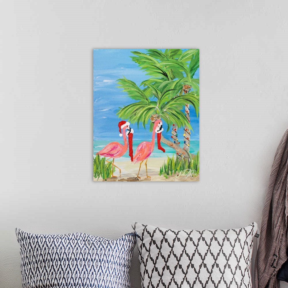 A bohemian room featuring Fun tropical Christmas themed painting of two pink flamingos carrying stockings in their beaks to...