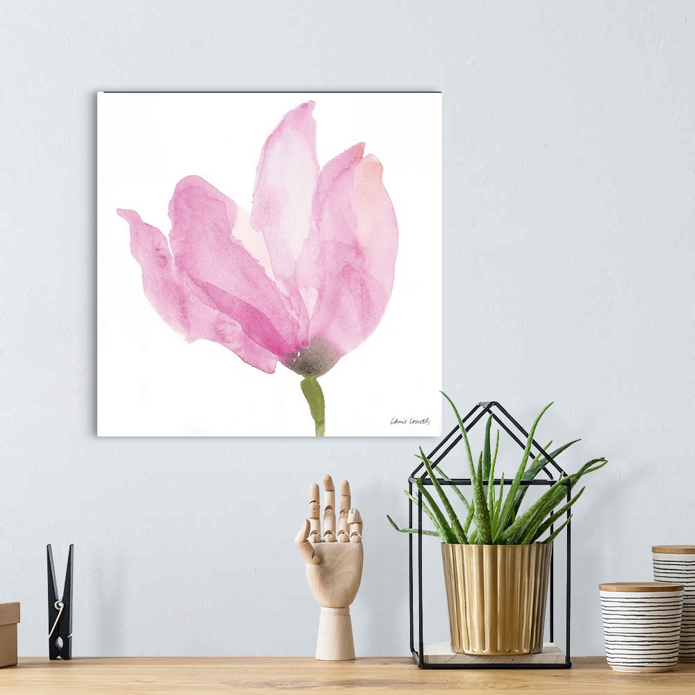 A bohemian room featuring A watercolor painting of a pink flower.