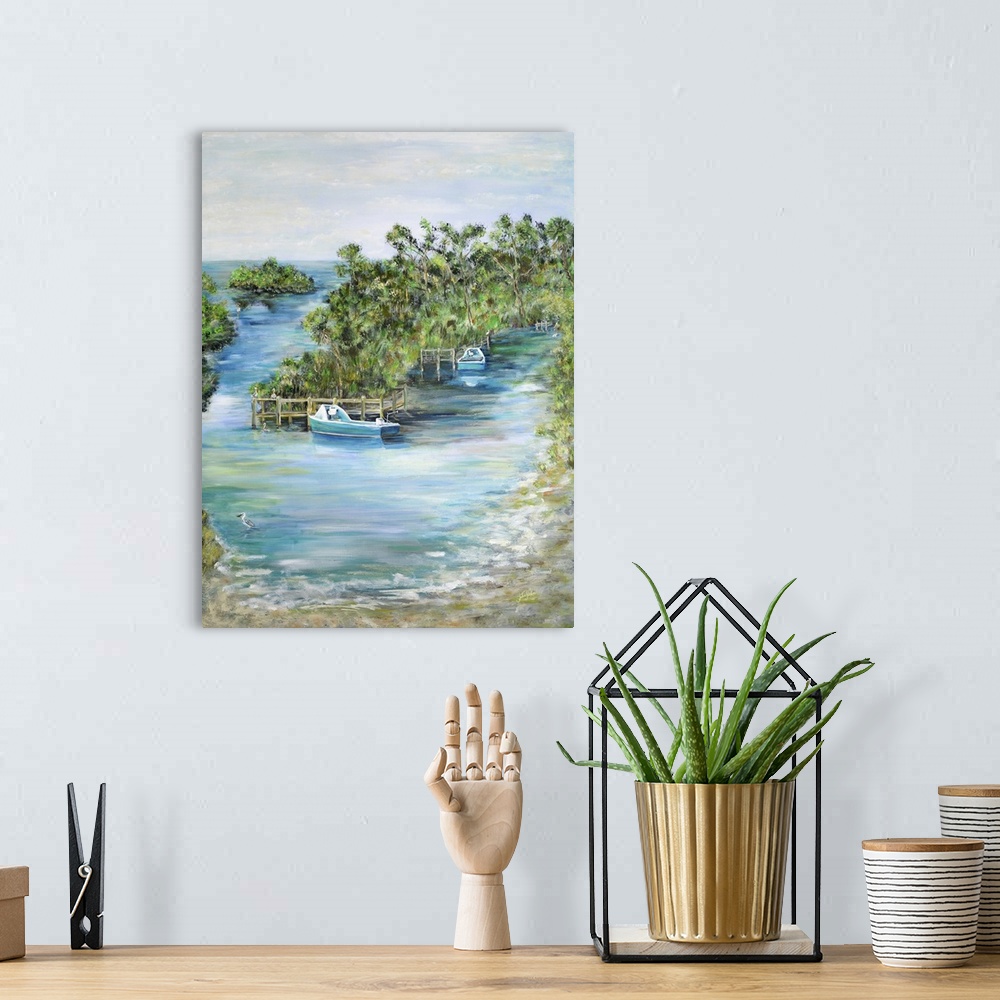 A bohemian room featuring Contemporary seascape artwork of boats docked at a tropical island.