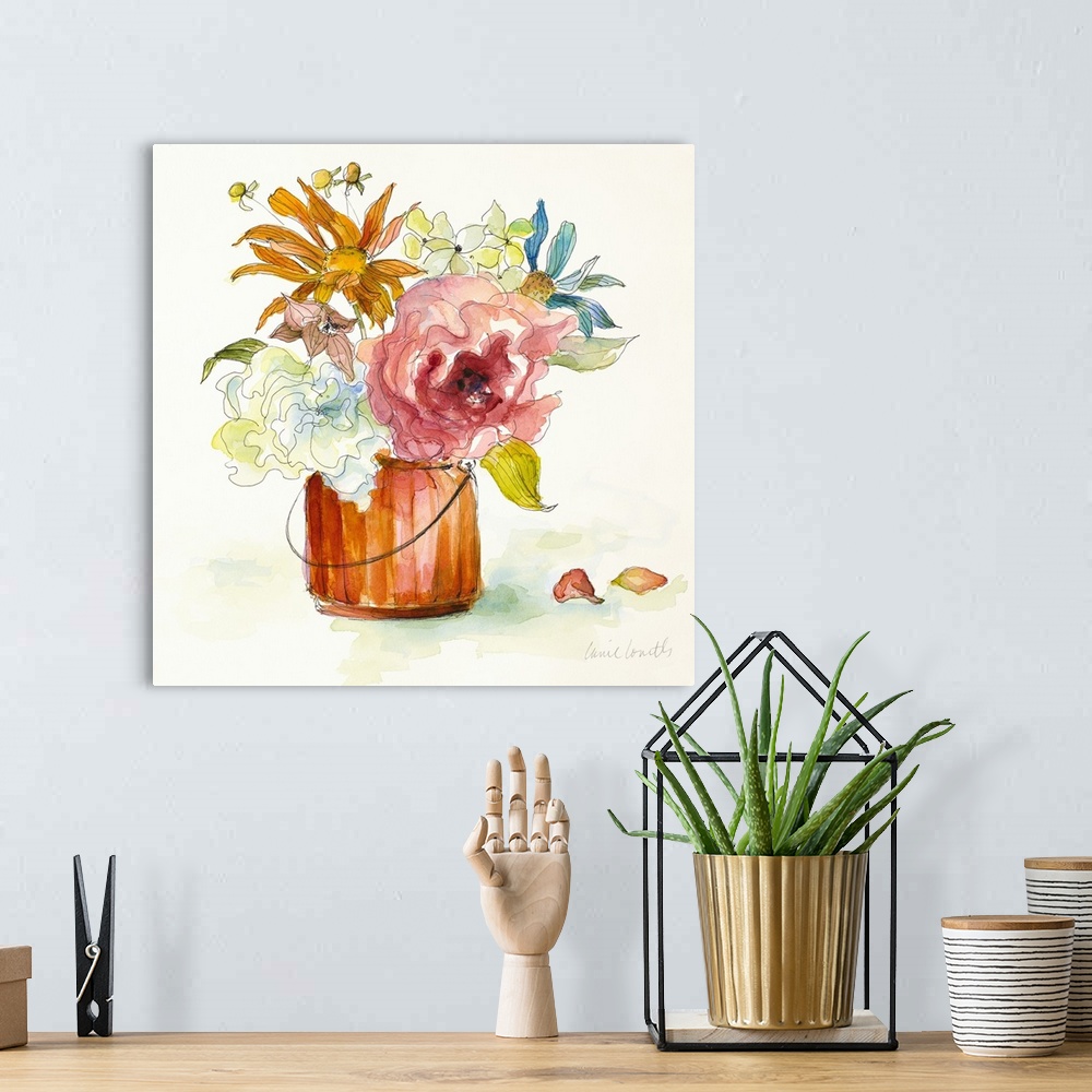 A bohemian room featuring Square watercolor painting of arranged wildflowers in an orange vase.