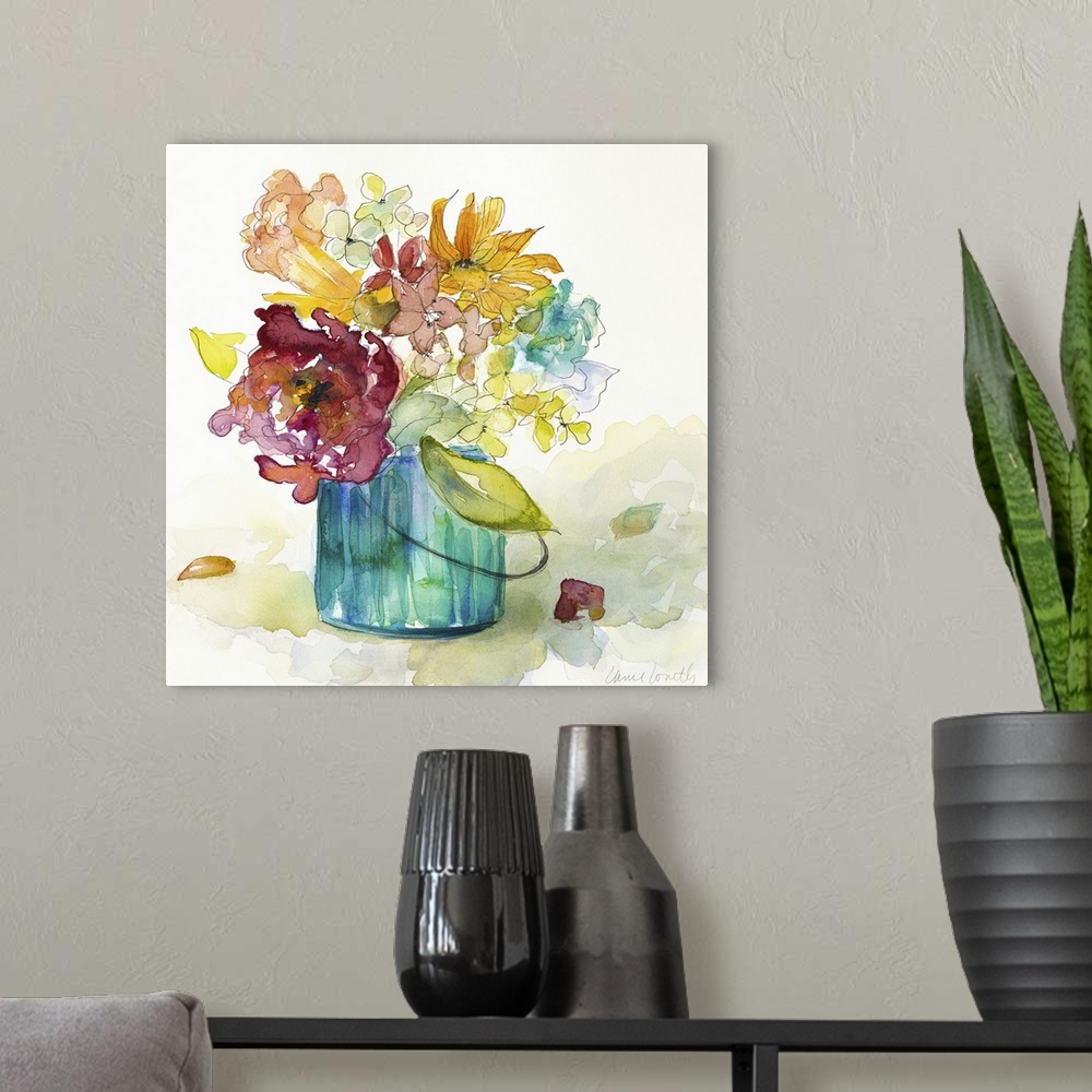 A modern room featuring Square watercolor painting of arranged wildflowers in a blue-green vase.