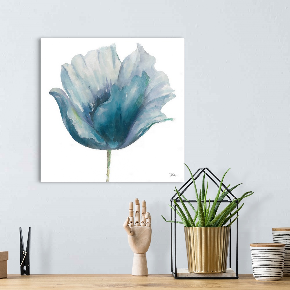 A bohemian room featuring This botanical artwork is comprised of watercolor layers in various shades of blue.