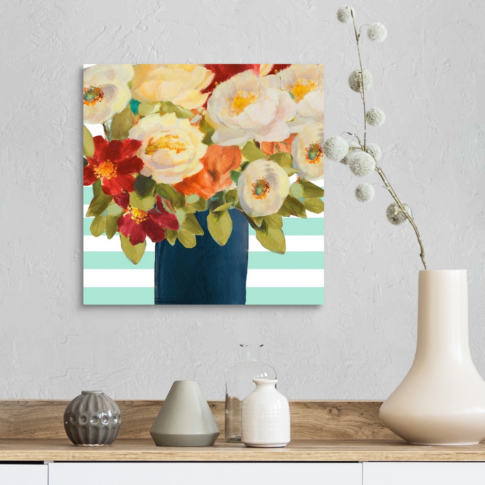 A farmhouse room featuring Painting of several colorful flowers in a dark blue vase.