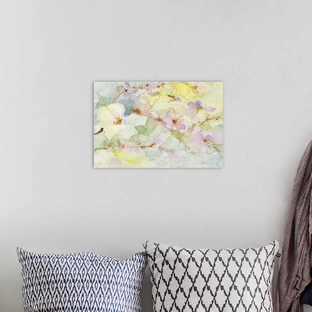 A bohemian room featuring Watercolor painting in soft pastels of blossoming flowers.