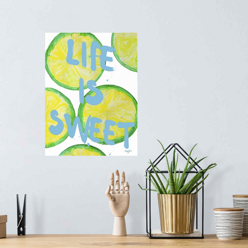A bohemian room featuring "Life is sweet" written over painted lime slices.