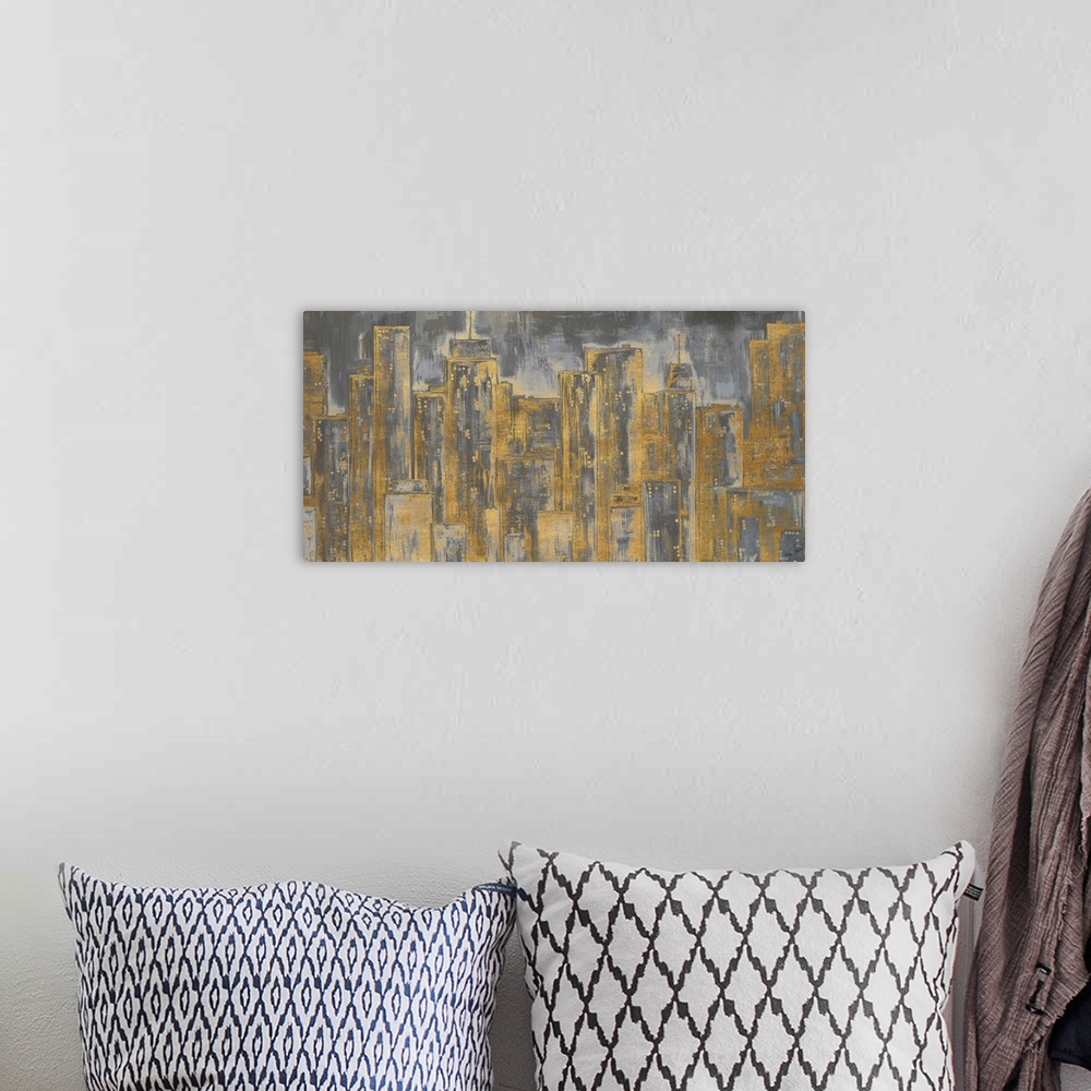 A bohemian room featuring Skyscrapers in a city painted in gold over dark grey.