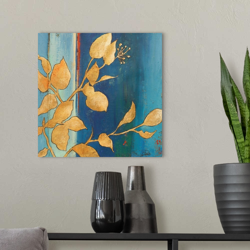 A modern room featuring Contemporary painting with an abstract blue background with gold silhouetted leaves in the foregr...
