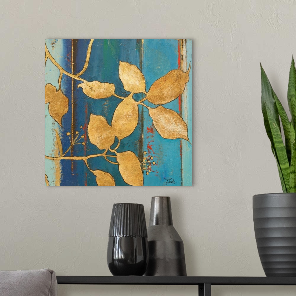 A modern room featuring Contemporary painting with an abstract blue background with gold silhouetted leaves in the foregr...