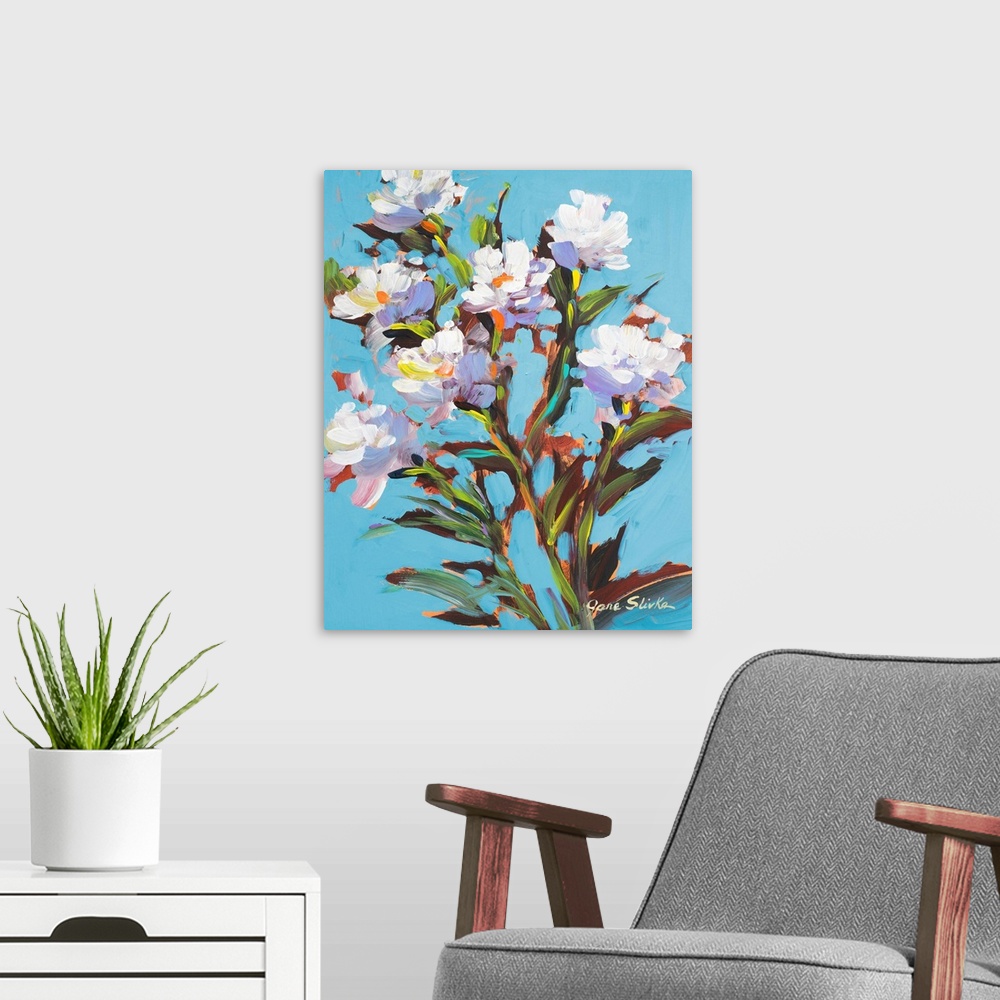 A modern room featuring Contemporary painting of several white flowers in bloom.
