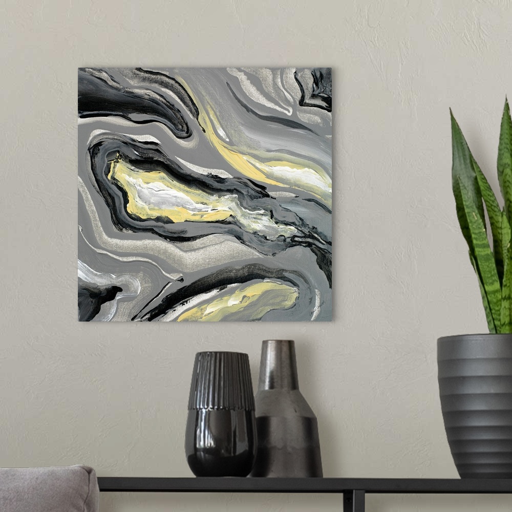 A modern room featuring Square abstract painting of a gray, yellow, and white geode.
