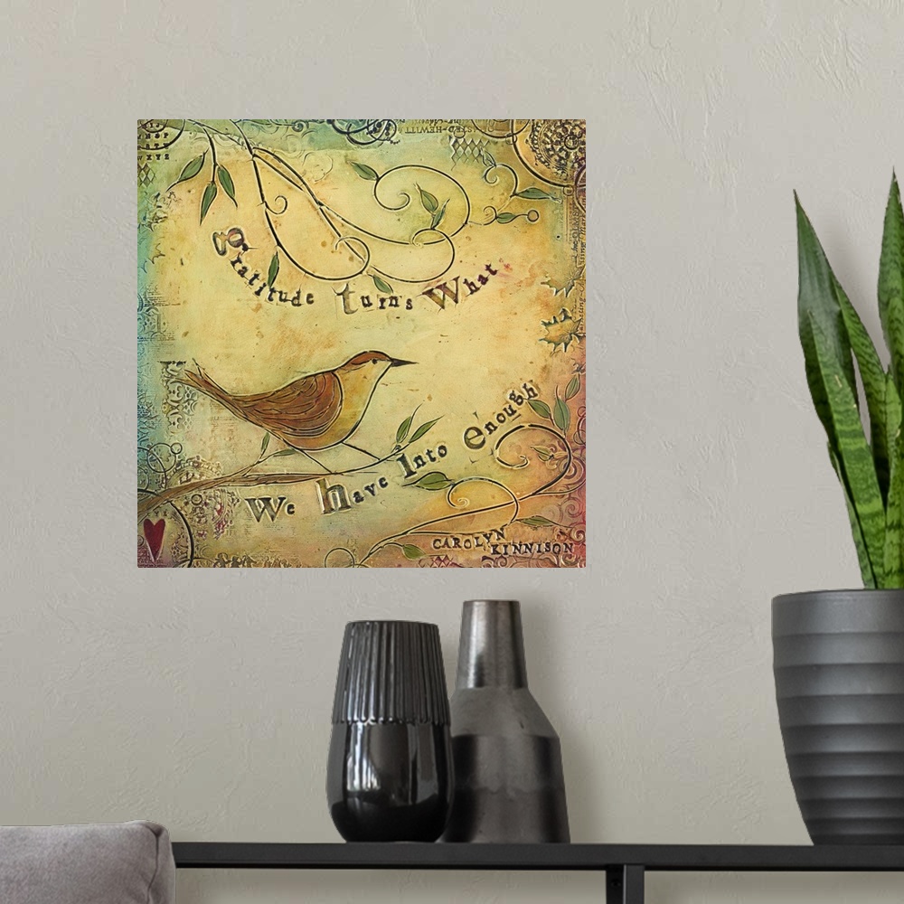 A modern room featuring An inspirational sentiment over a painting of a bird on curly branches.