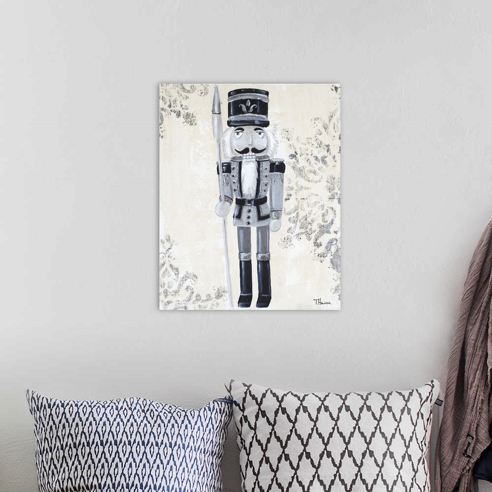 A bohemian room featuring Black, silver, and gray painting of a nutcracker with a textured neutral colored background with ...