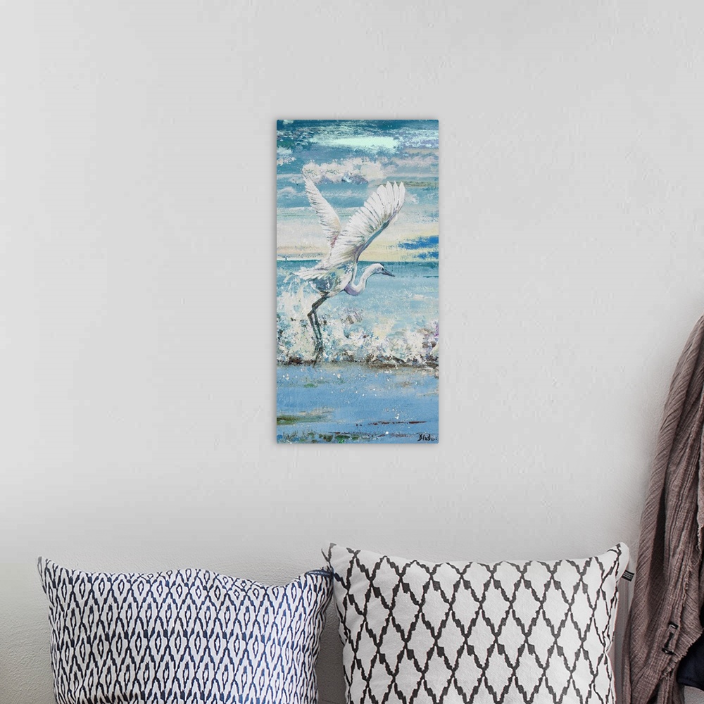 A bohemian room featuring Contemporary painting of a white egret taking flight from the water.