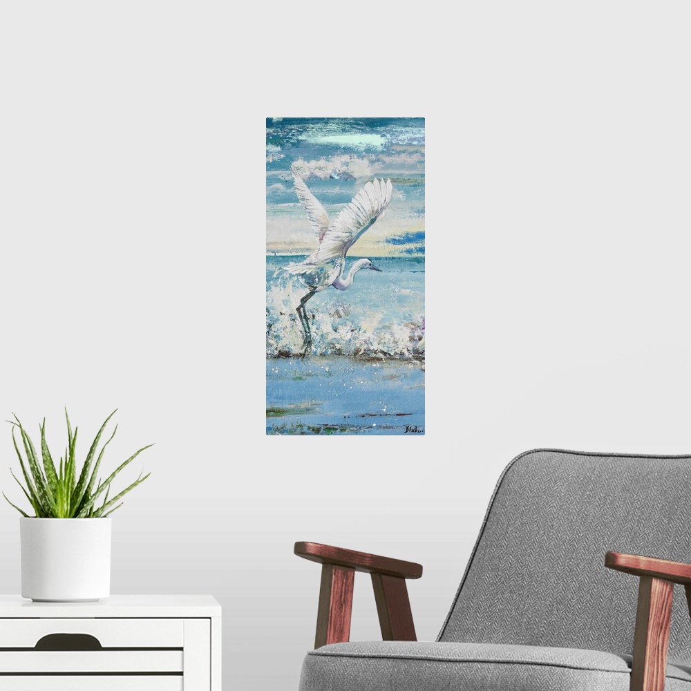 A modern room featuring Contemporary painting of a white egret taking flight from the water.