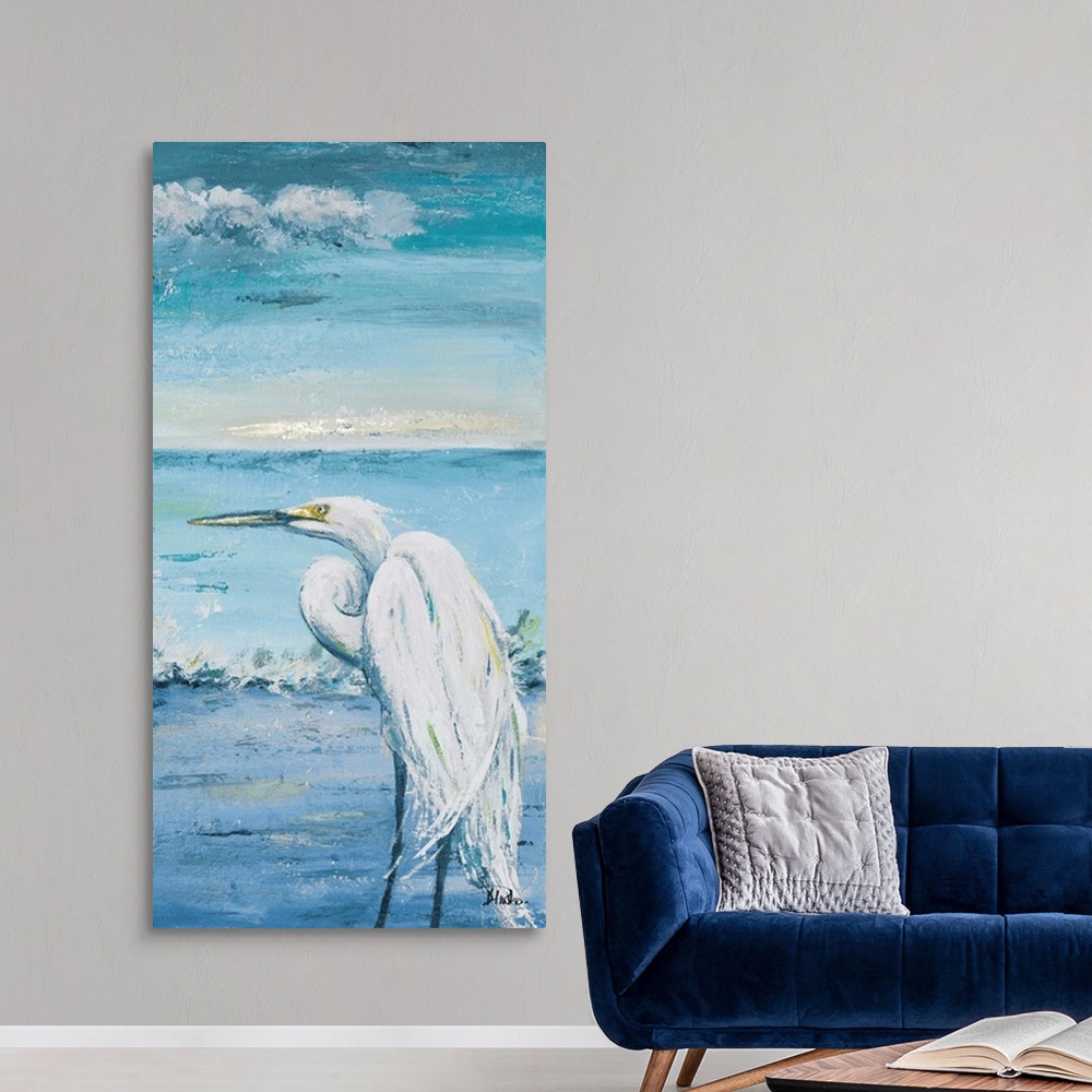 A modern room featuring Contemporary painting of a white egret overlooking the blue water.