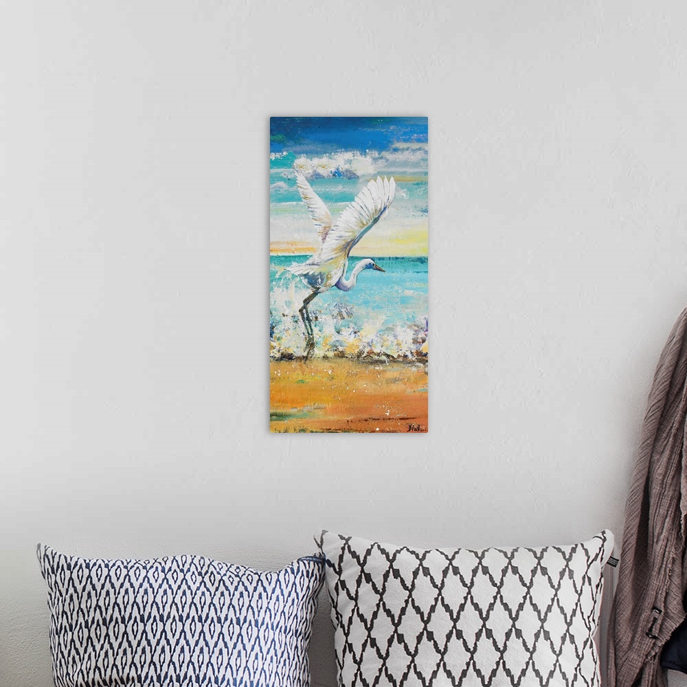 A bohemian room featuring Contemporary painting of a white egret taking to flight on a beach.