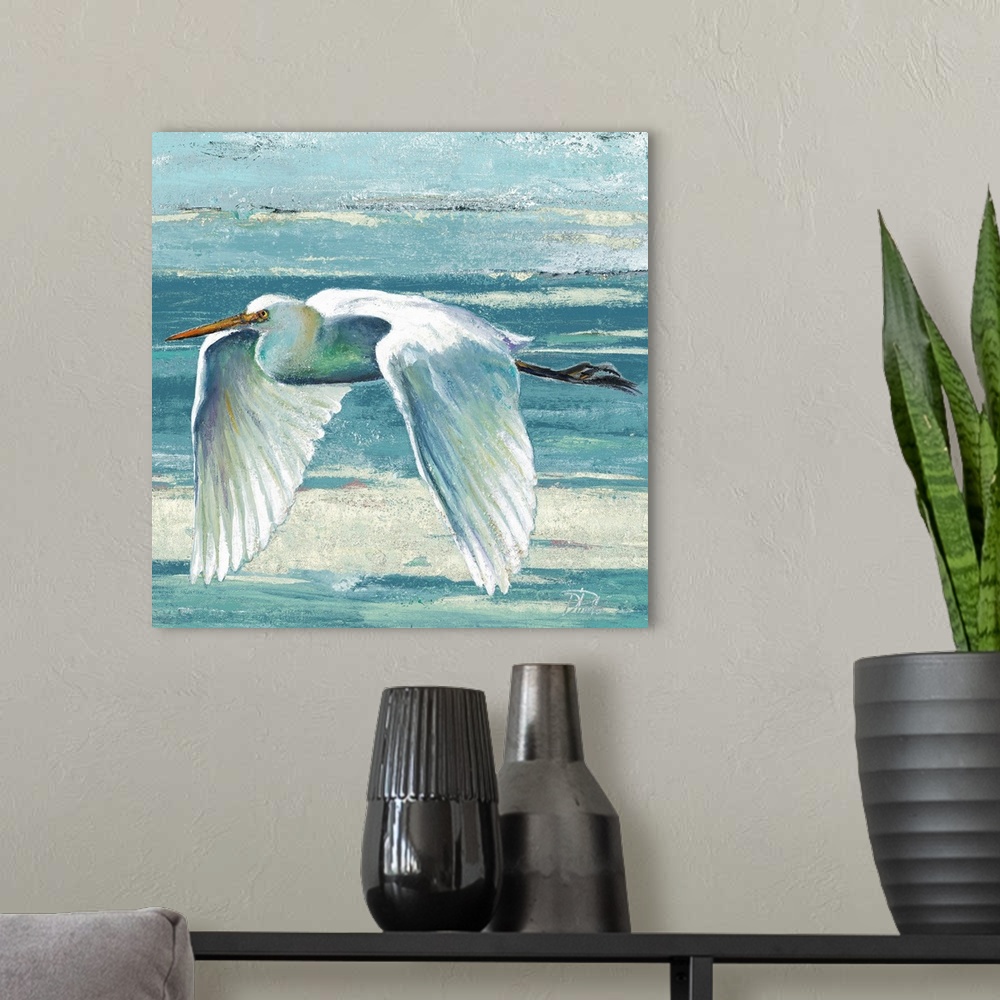 A modern room featuring Contemporary painting of a white egret in flight against a blue abstract background.