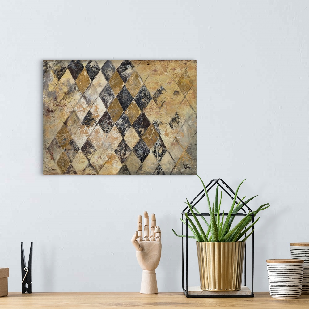 A bohemian room featuring A contemporary abstract painting of a gold, black, and gray rustic diamond shaped pattern.