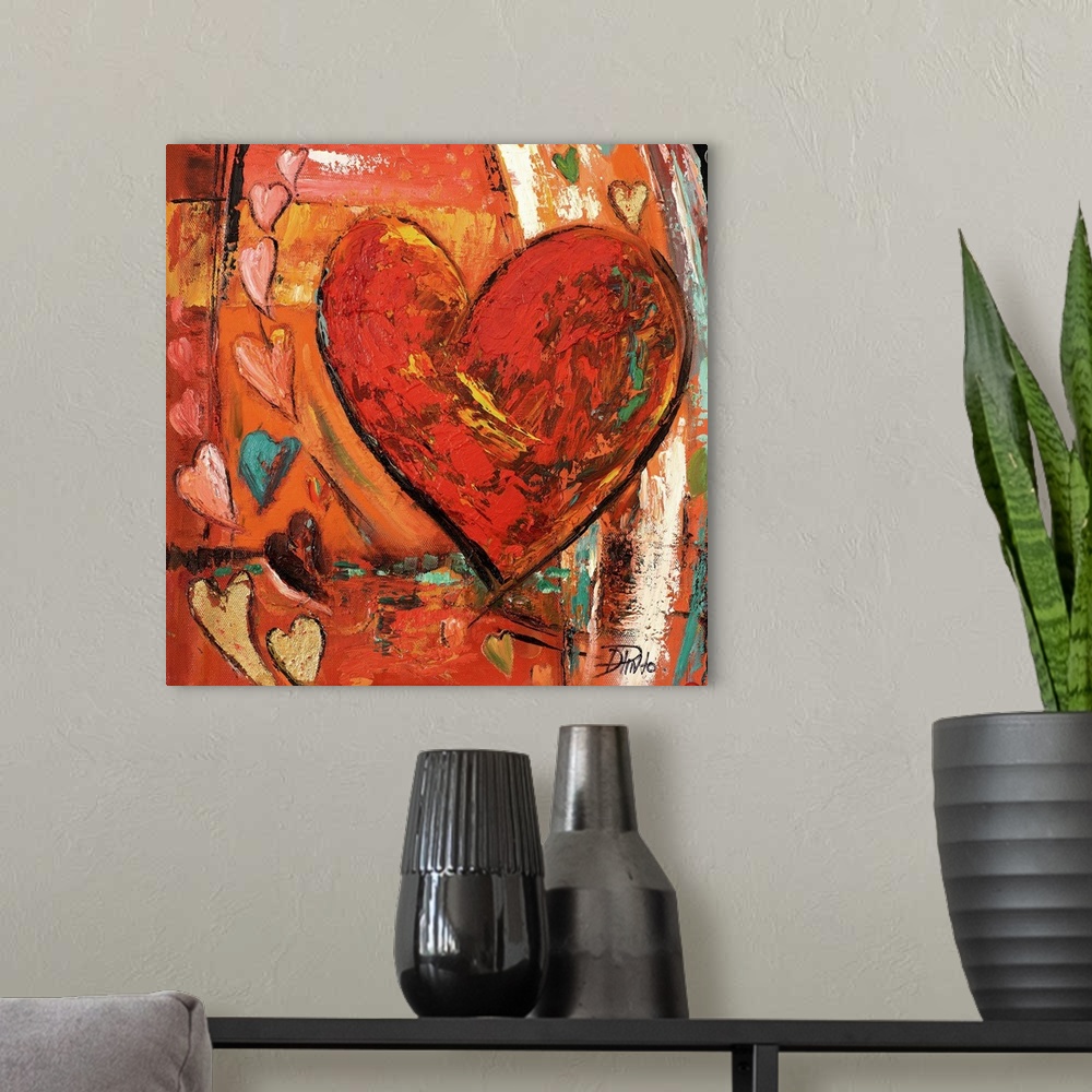 A modern room featuring Painting of a large red heart with several smaller hearts around it.