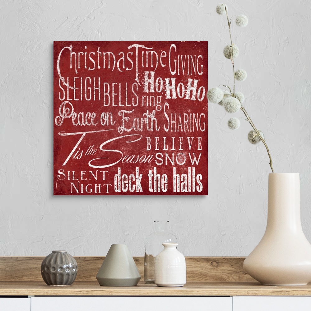 A farmhouse room featuring Typography panel of Christmas-themed text, including carol lyrics and festive themes such as "Pea...