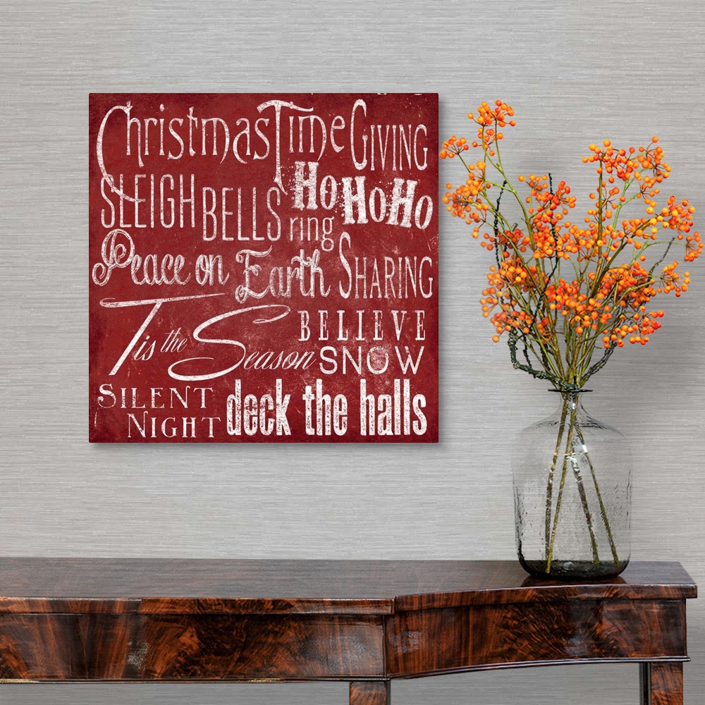 A traditional room featuring Typography panel of Christmas-themed text, including carol lyrics and festive themes such as "Pea...