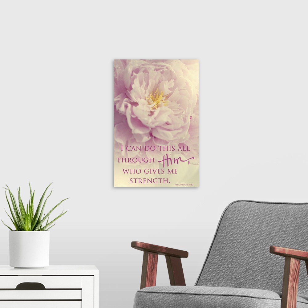 A modern room featuring Photograph of a pink flower with a yellow center and the bible verse "I can do all though Him, Wh...