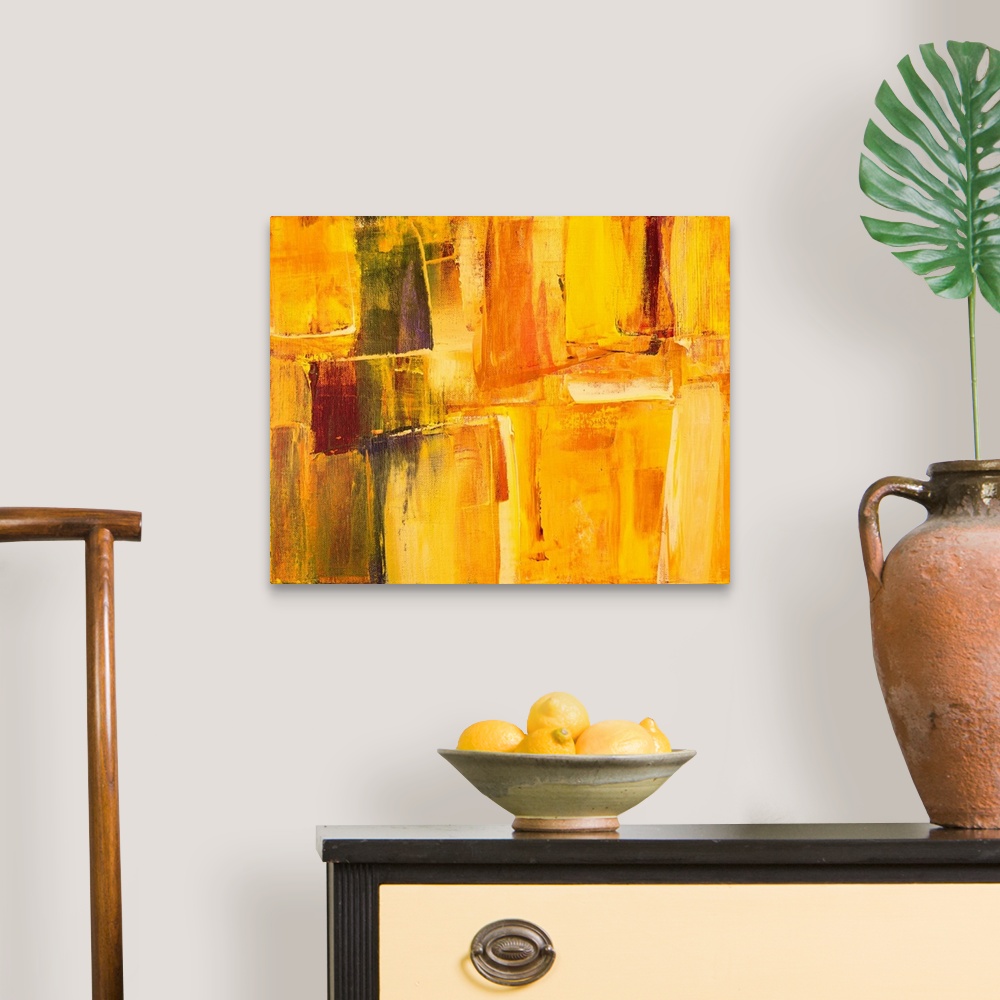 A traditional room featuring Fiery oranges and fierce reds decorate this contemporary artwork in blocks of color.