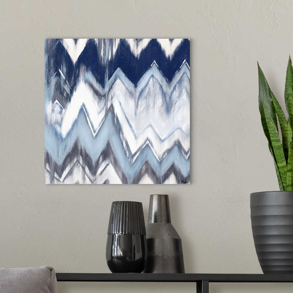A modern room featuring Contemporary blue chevron pattern with a weathered and rustic look to it.