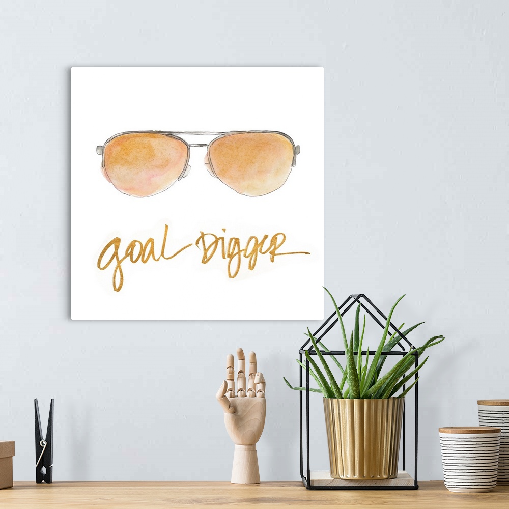 A bohemian room featuring Square watercolor painting of sunglasses with the phrase "Goal Digger" written at the bottom in m...