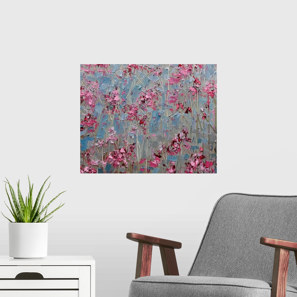 A modern room featuring Contemporary abstract painting resembling little red flowers against a blueish background.