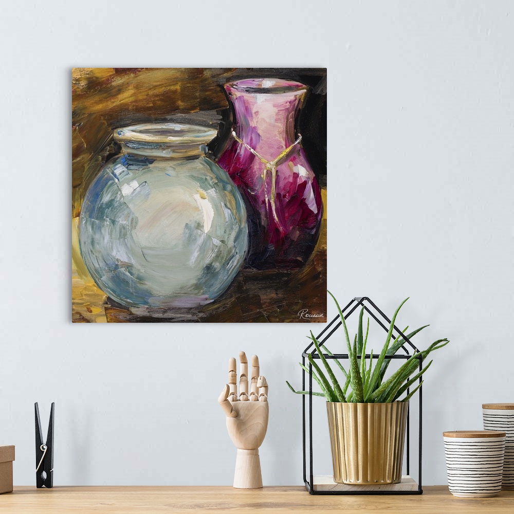 A bohemian room featuring Contemporary artwork of a blue and pink vase.