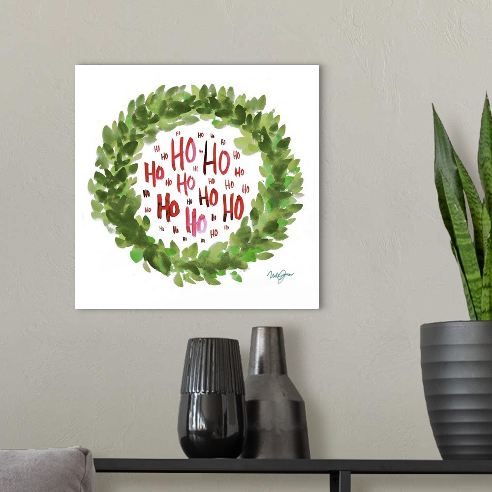 A modern room featuring Square watercolor painting of a green Christmas wreath with "Ho" written inside in red several ti...